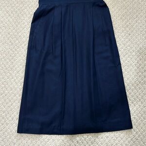 Women skirt. Great for work . Excellent condition. Navy Blue color.